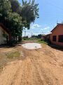 Rua sem asfalto e com poça de água, em decorrência da chuva. Bairro Grotões, Balsas, Maranhão.